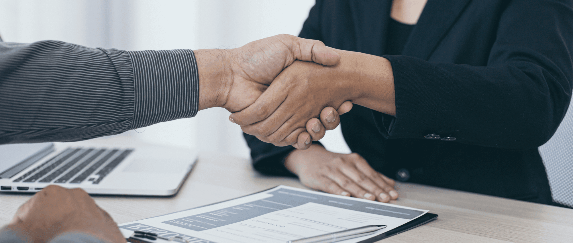 shaking hands at a job interview