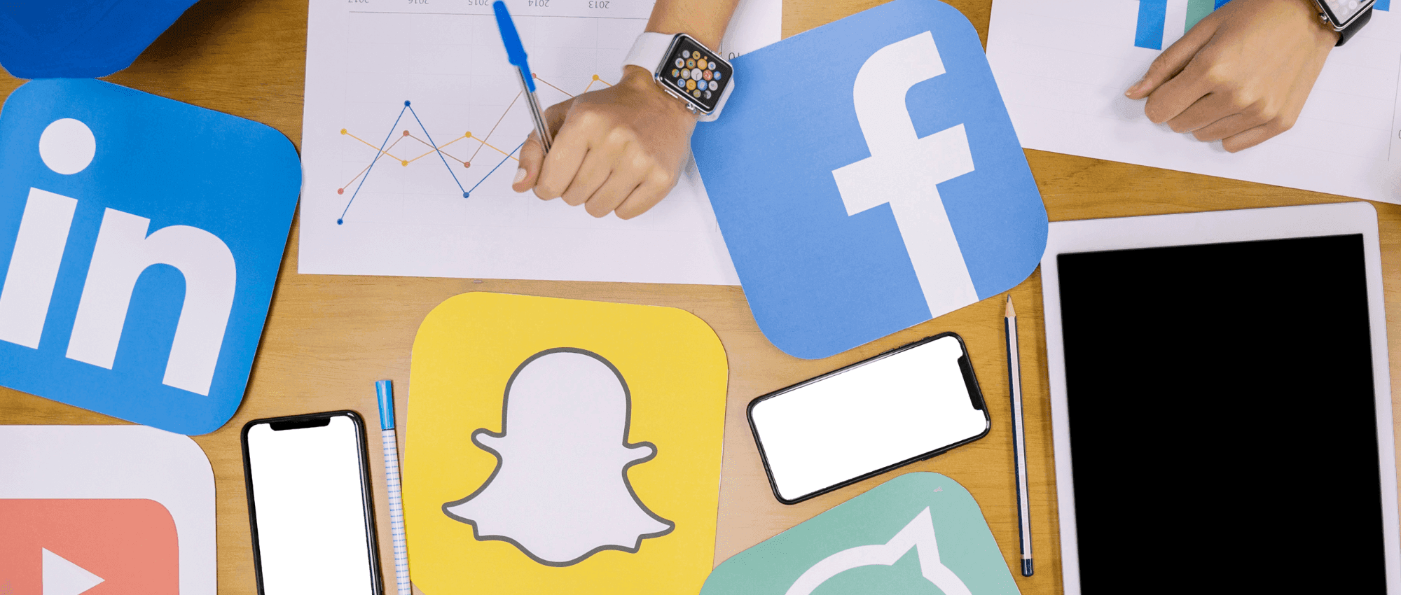 desk with social media icons on it