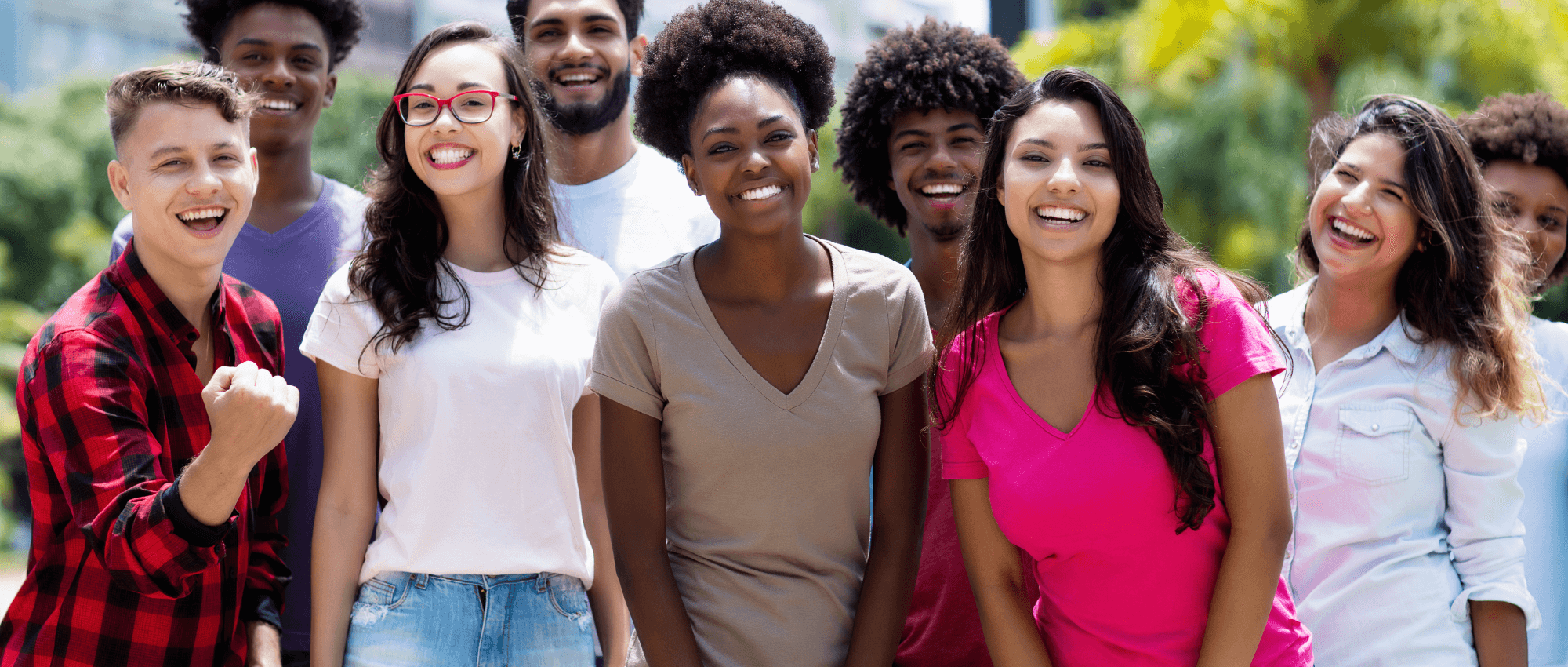 A group of youth smiling to the camers