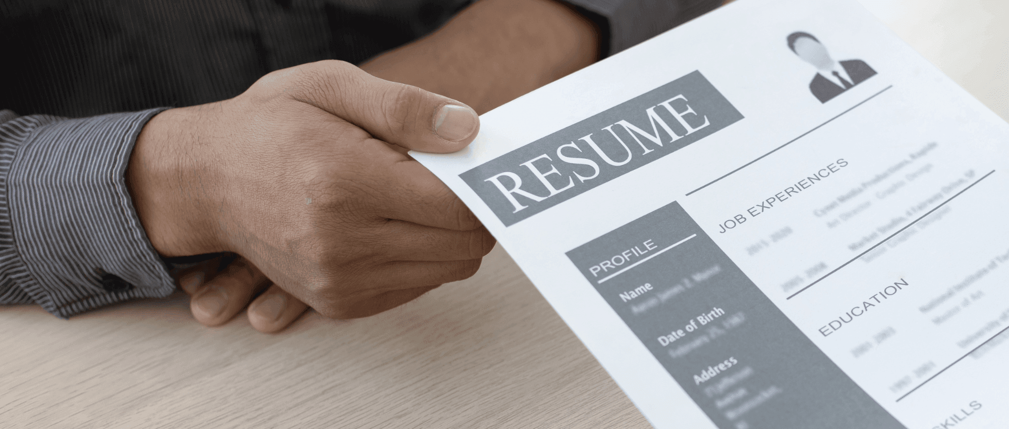Someone grabbing the resume