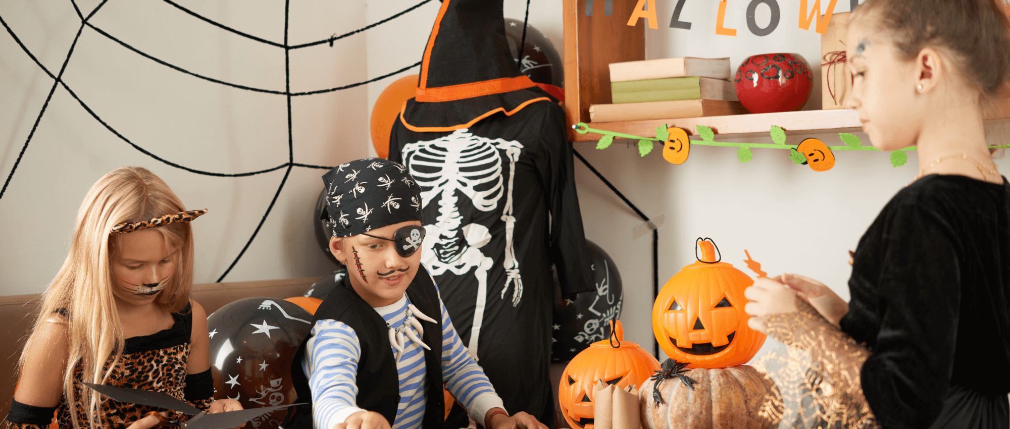 Kids wearing Halloween costumes