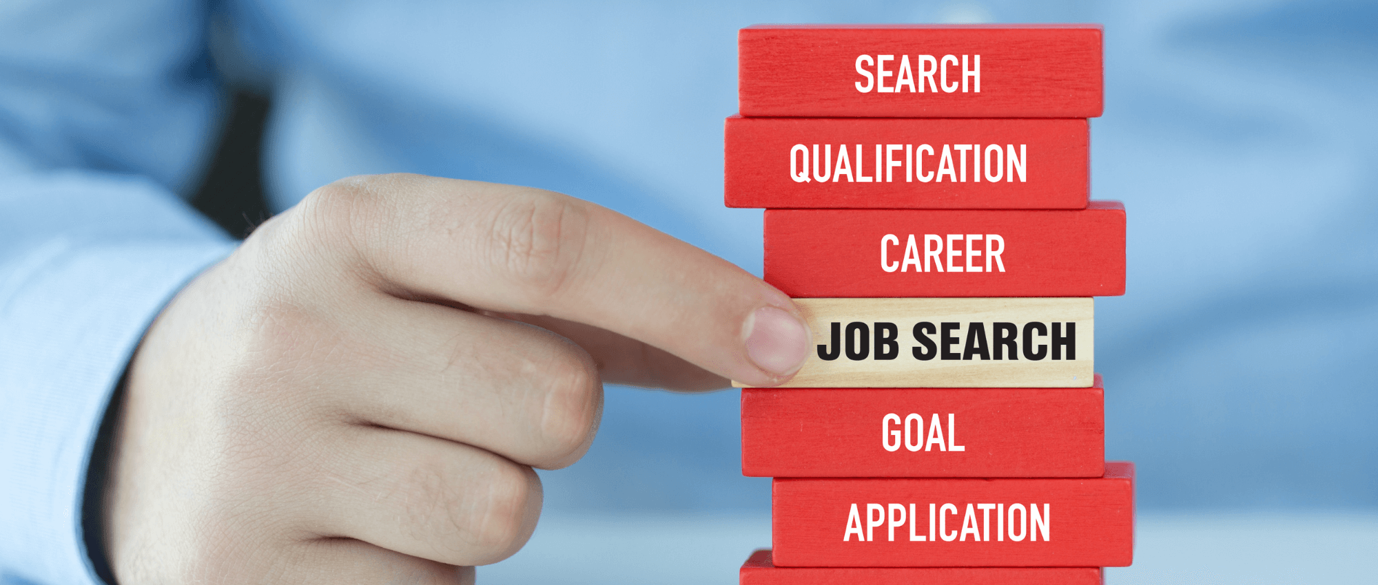 Someone holding a job search cube