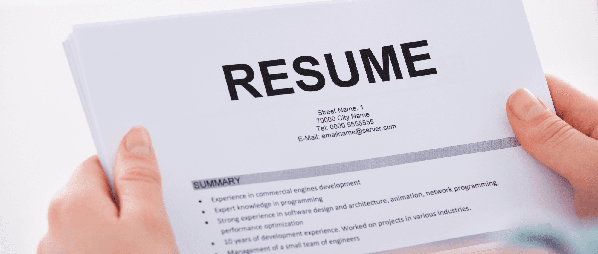 Someone holding the Resume