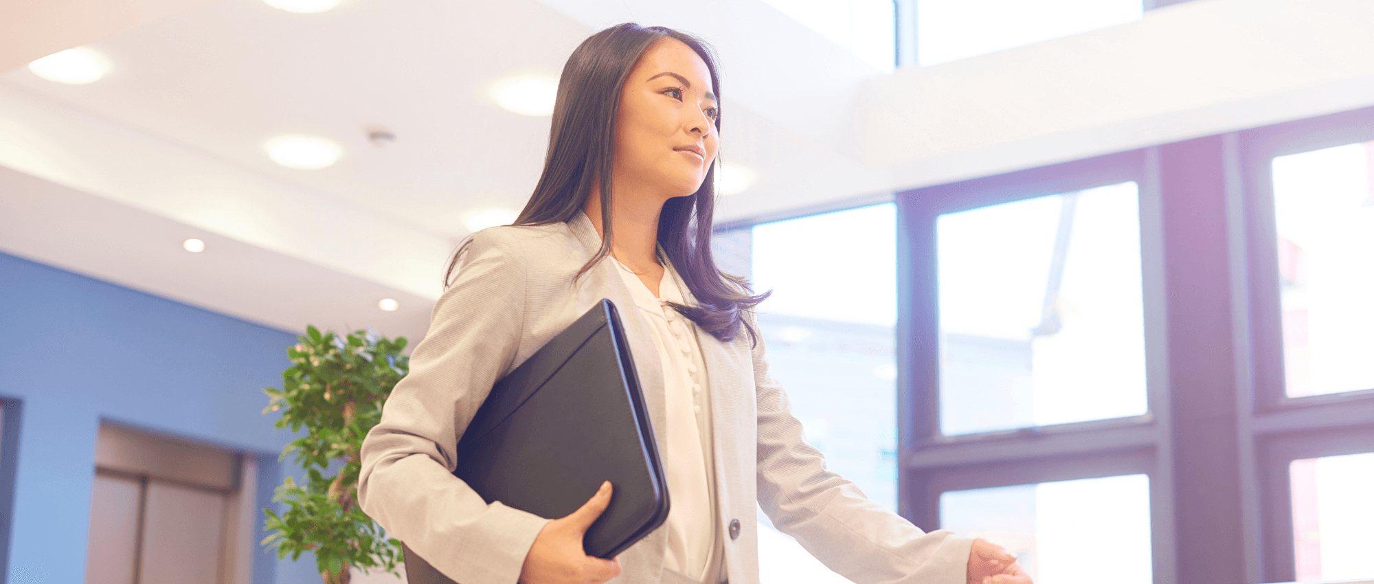 A person holding a file in an office