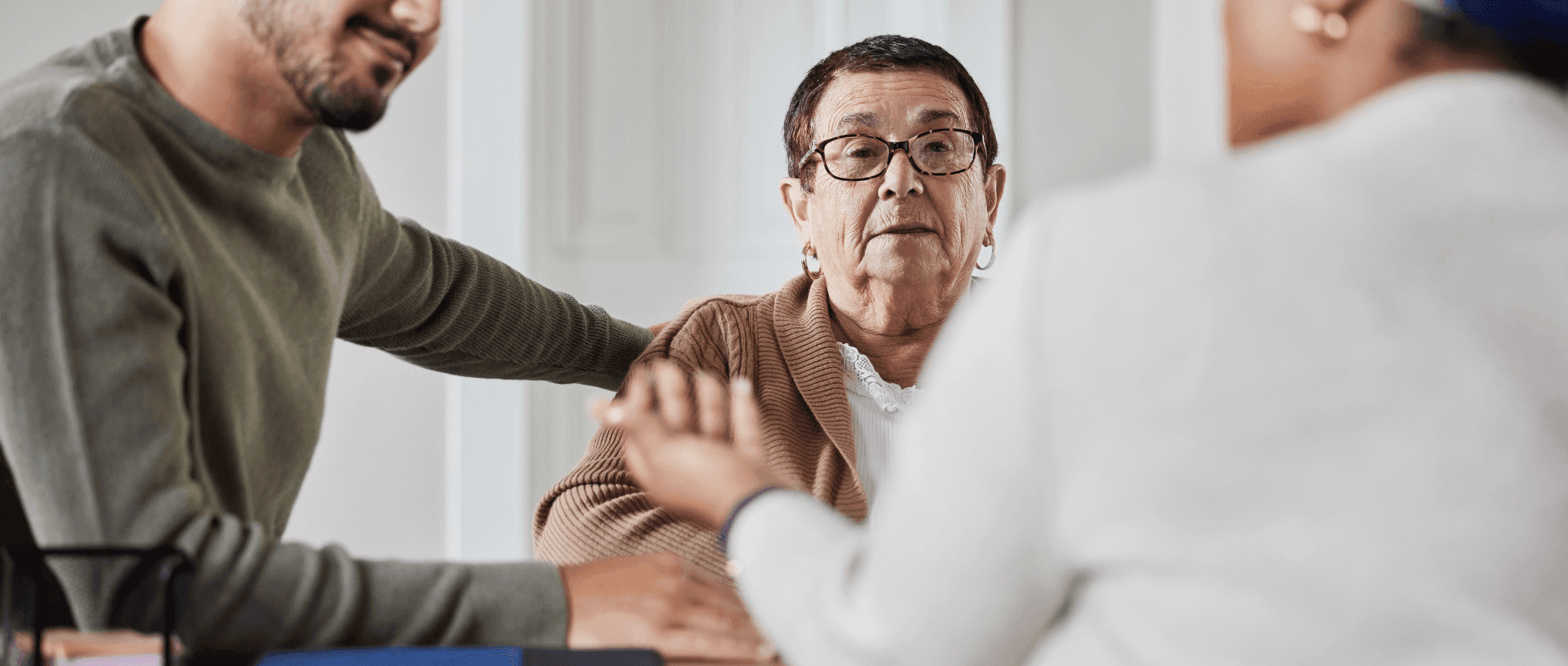 A senior woman consulting a younger woman