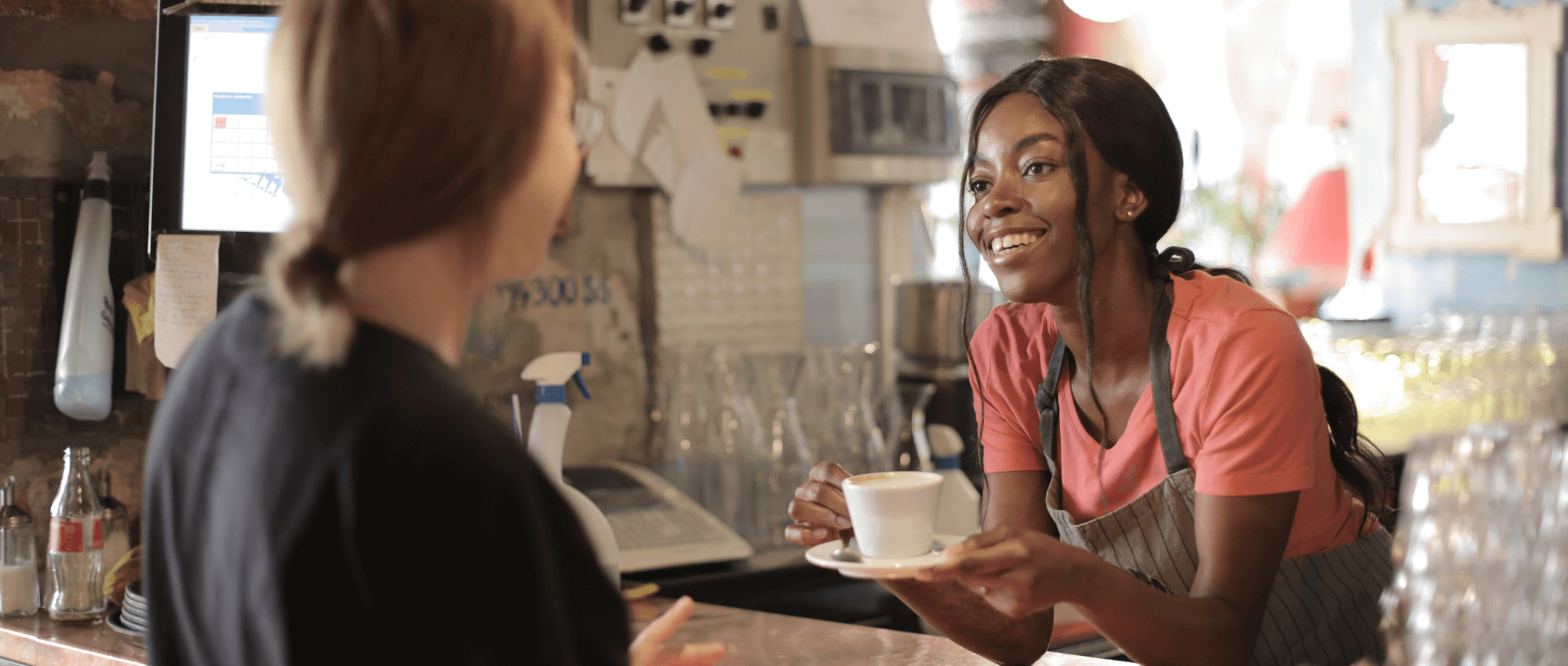 Female serving Coffee