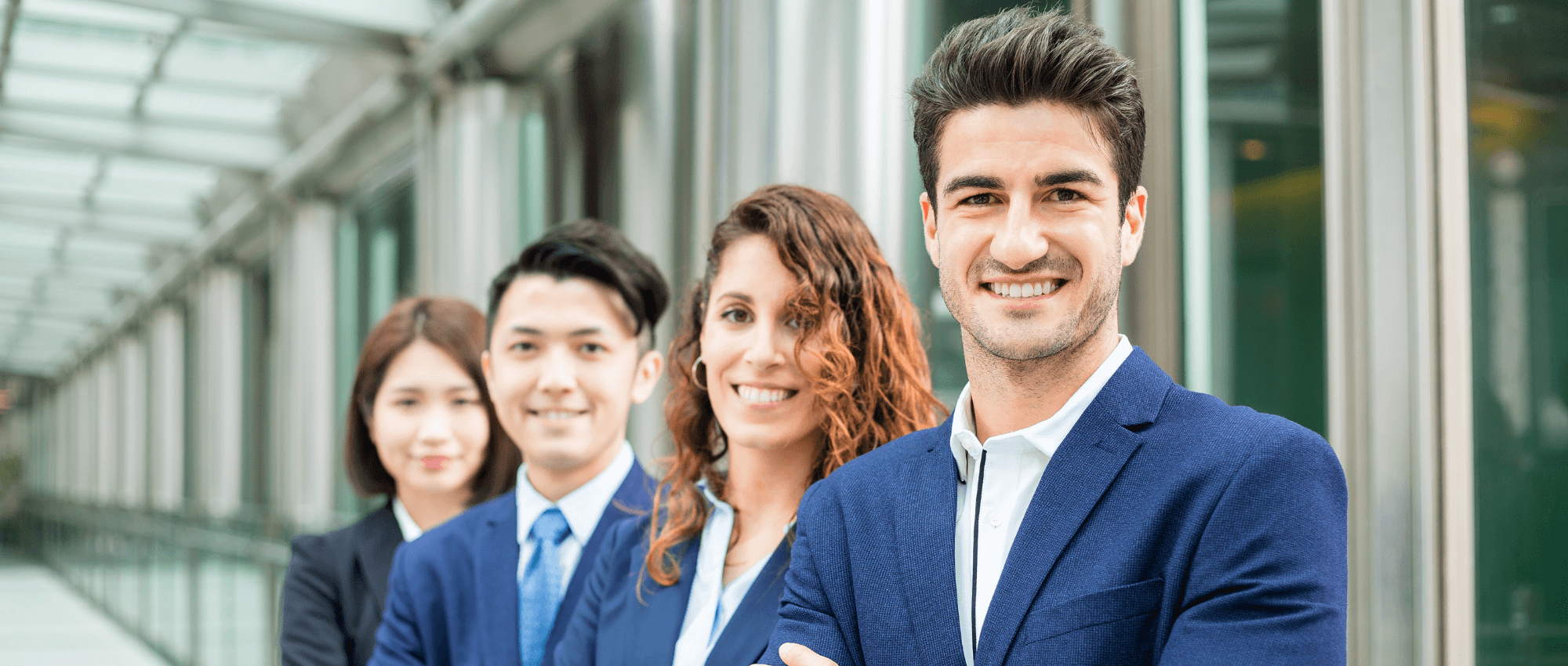 Business men and women standing for a shot