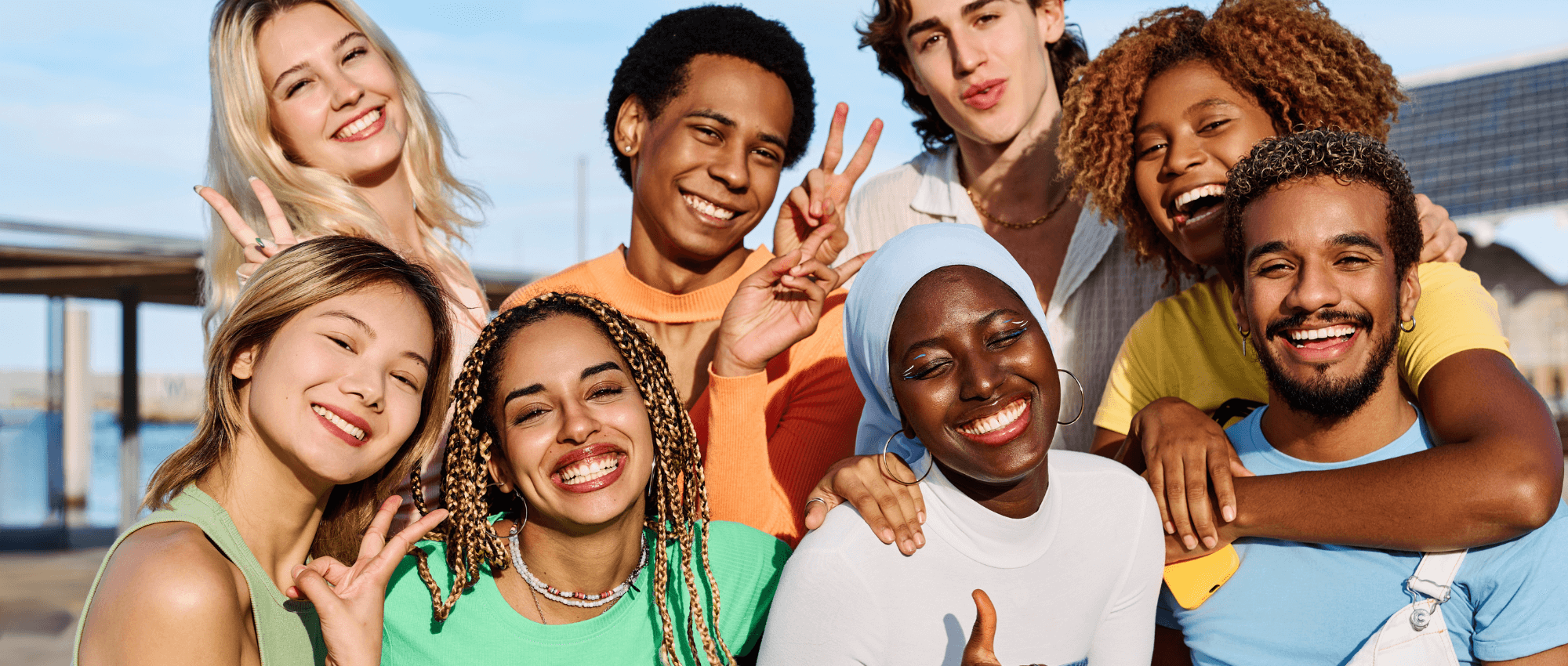 Happy youth group smiling to camera