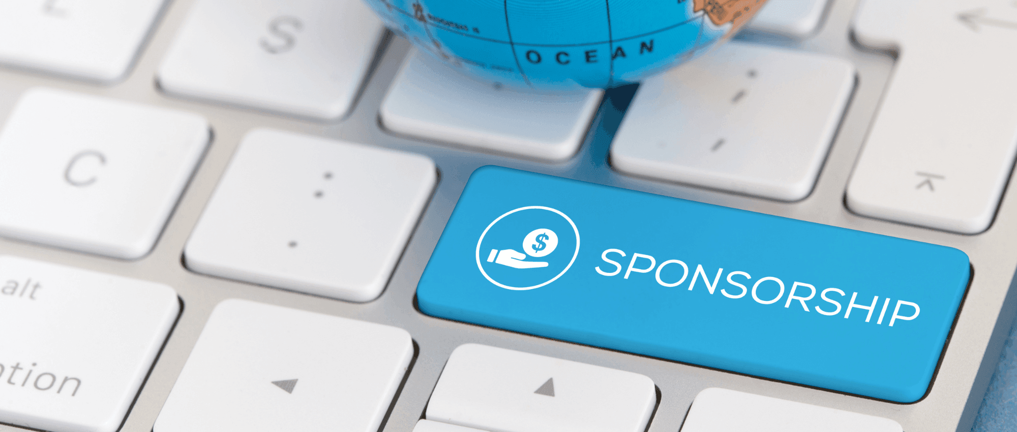 Keyboard with a blue button that says sponsorship