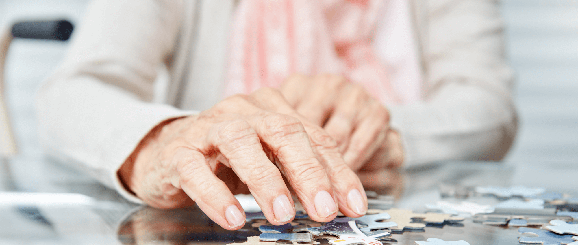 A senior playing puzzle