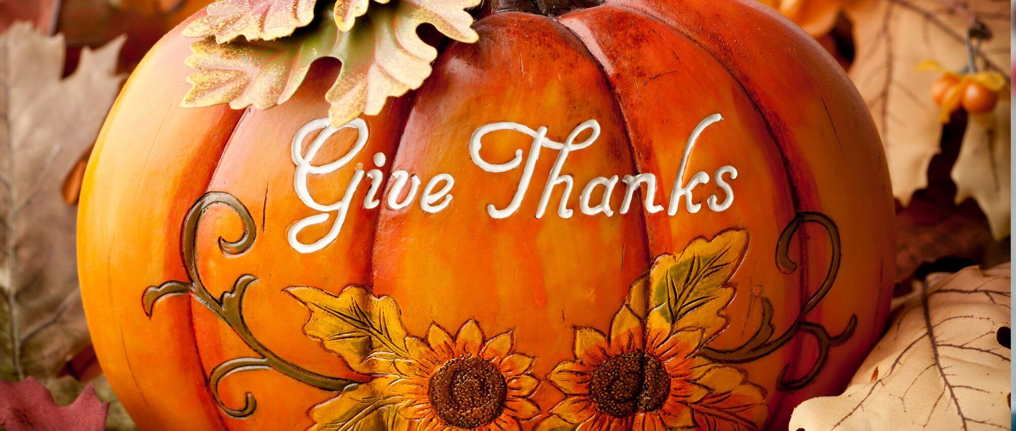 Pumpkin that has Give Thanks engraved on it.